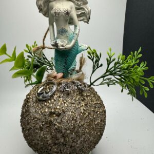 Mermaid with silver charms on 6” gold sphere.